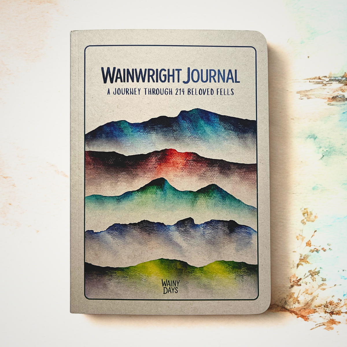 Wainwright Journal with mountain design on a light background